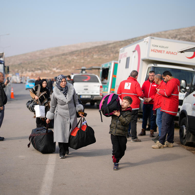 Syrian refugees in Türkiye, including families with children, arrive at the Cilvegözü – Bab Al-Hawa border crossing point between Türkiye and Syria, with their luggage, to complete a voluntary repatriation process, before crossing into Syria to return home.