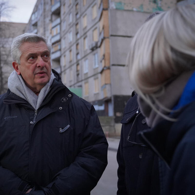 Ukraine. UN High Commissioner for Refugees Filippo Grandi visits an attack site in residential area in Kharkiv.