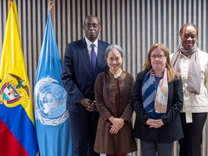 Un hombre y tres mujeres en foto, lideres de la ONU de Soluciones Duraderas 
