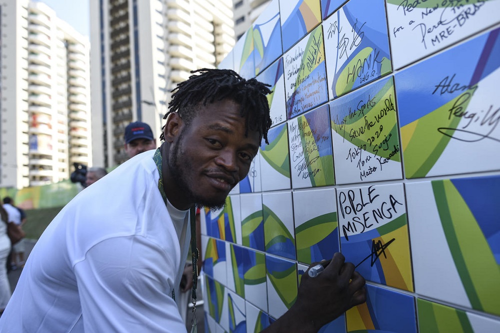 Brazil. Congolese judoka signs the Olympic Truce Wall in Rio