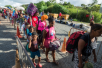 Mais de quatro milhões de refugiados e migrantes da Venezuela lutam para acessar necessidades básicas nas Américas