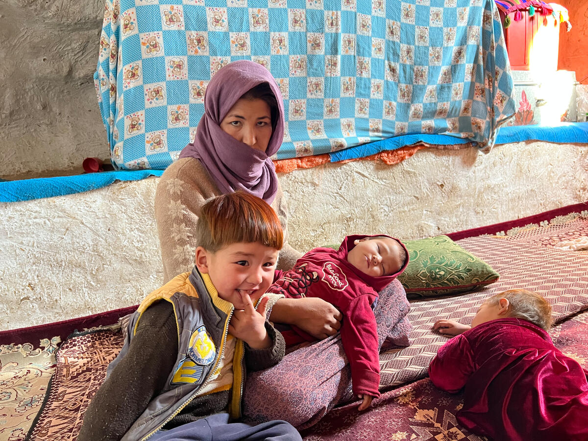 Afghanistan. Vulnerable family living in cave cliffs receive financial support from UNHCR