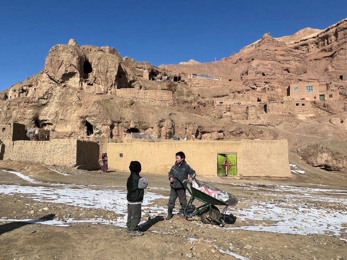 Afghanistan. Vulnerable family living in cave cliffs receive financial support from UNHCR